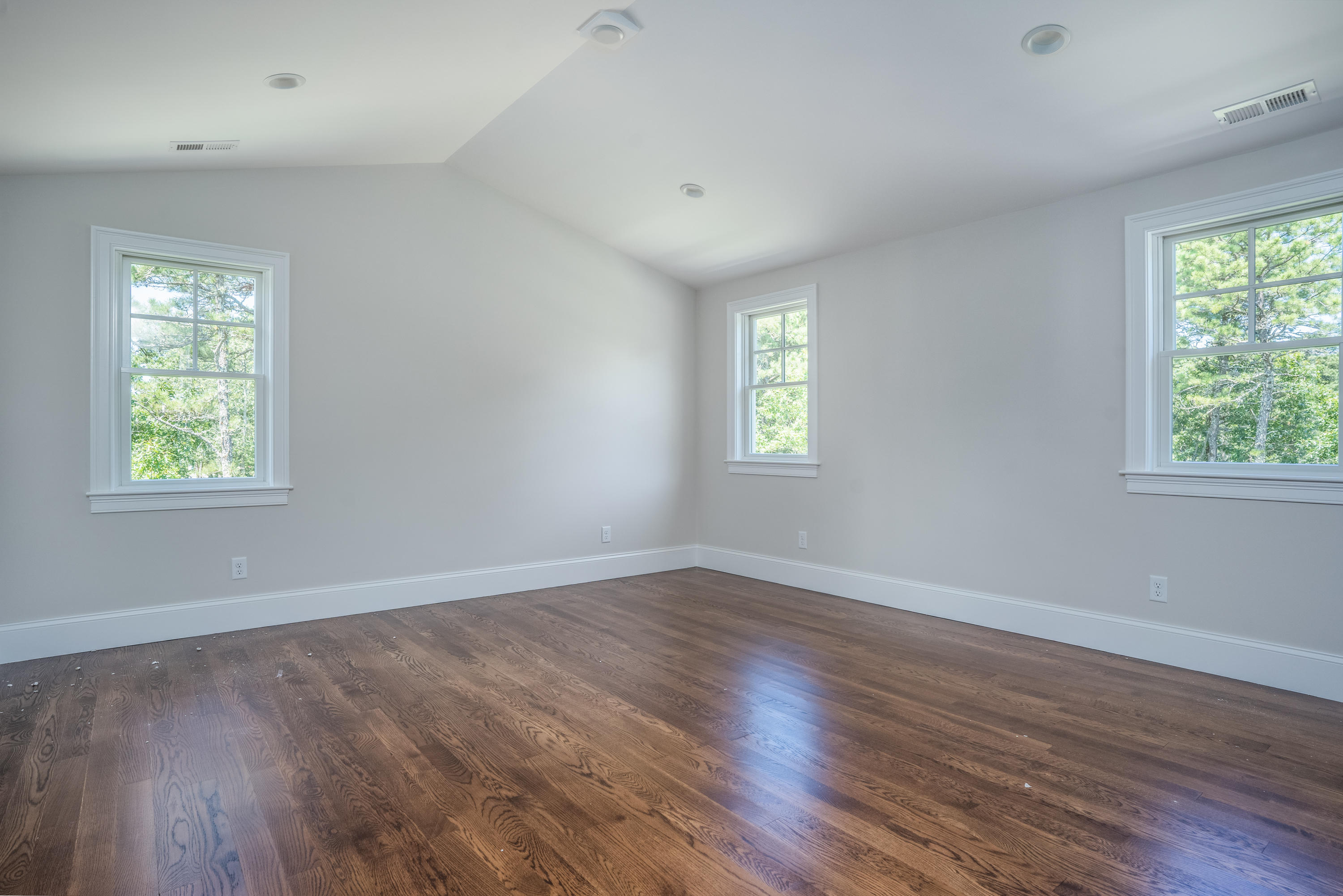 14 Crocker Rise Road Harwich, MA 02645 - Photo 21 of 38 an empty room with wooden floor and windows