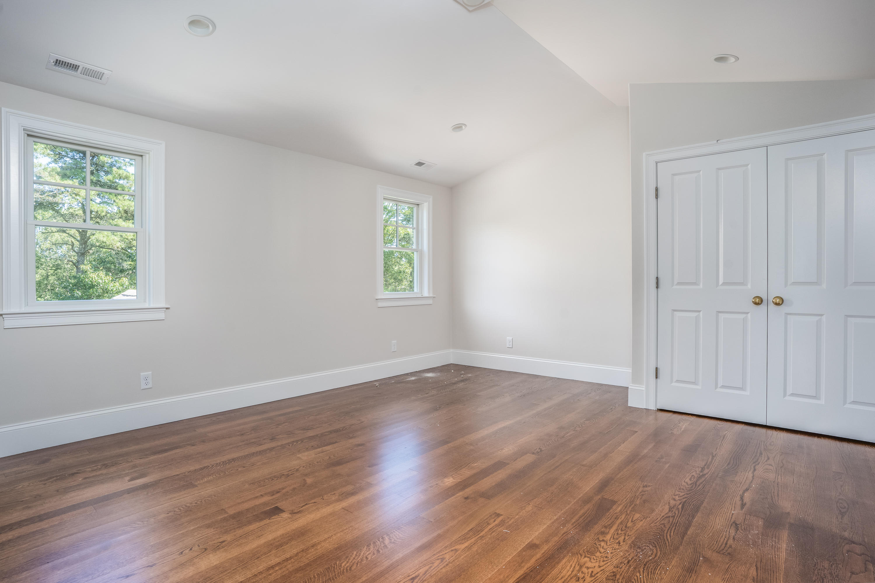 14 Crocker Rise Road Harwich, MA 02645 - Photo 27 of 38 an empty room with wooden floor and window