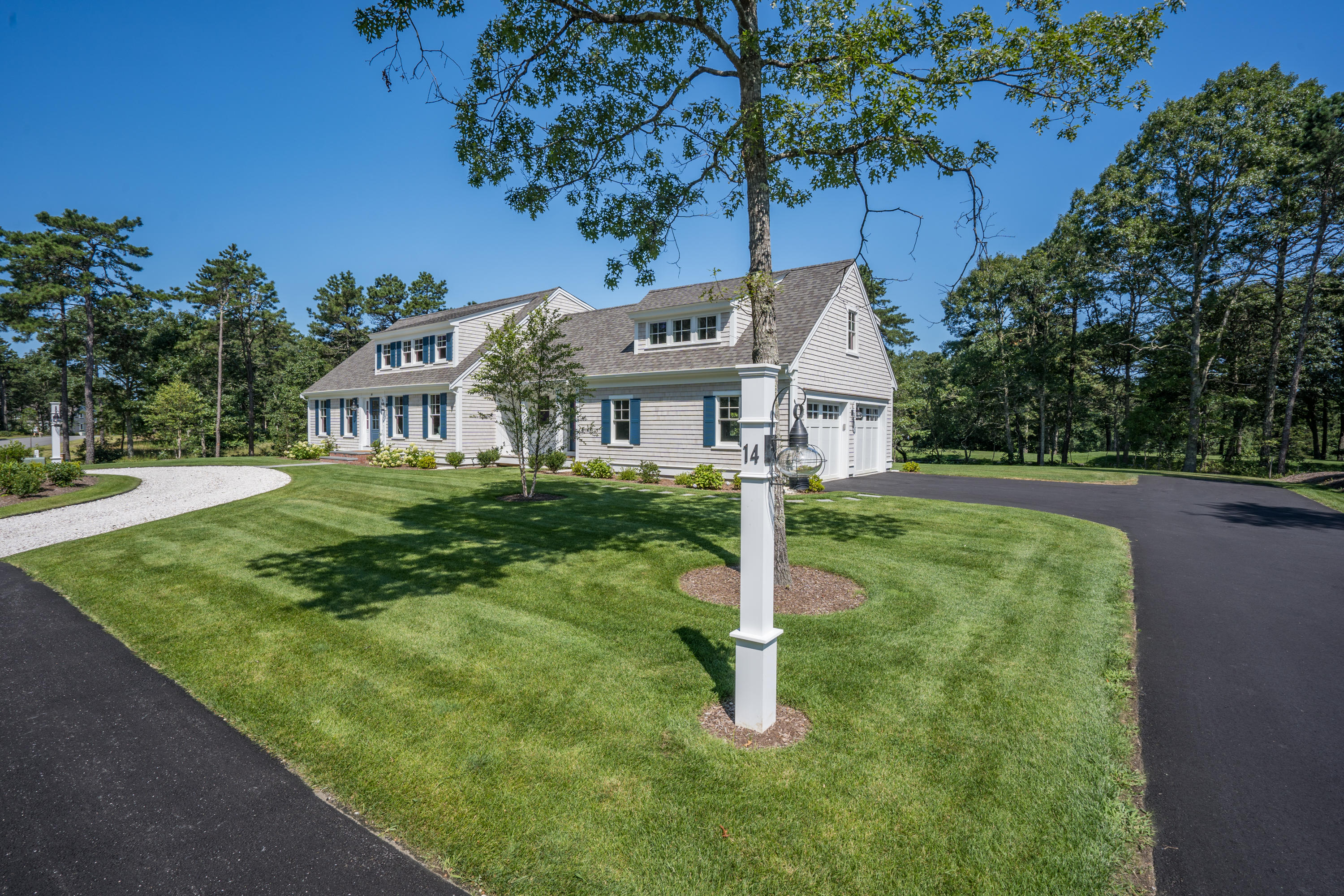 14 Crocker Rise Road Harwich, MA 02645 - Photo 35 of 38 a front view of a house with a yard