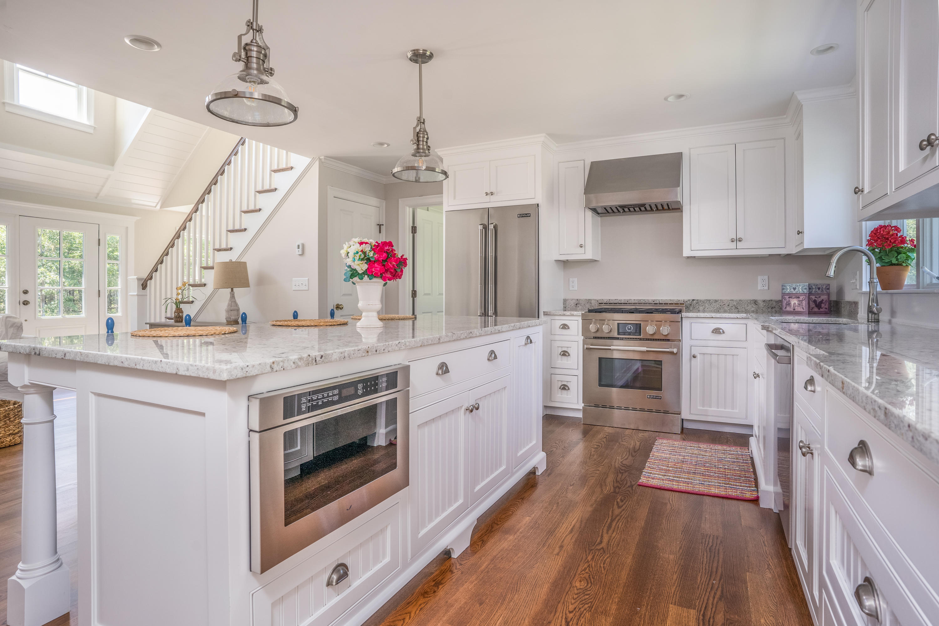 14 Crocker Rise Road Harwich, MA 02645 - Photo 7 of 38 a kitchen with granite countertop a stove and cabinets