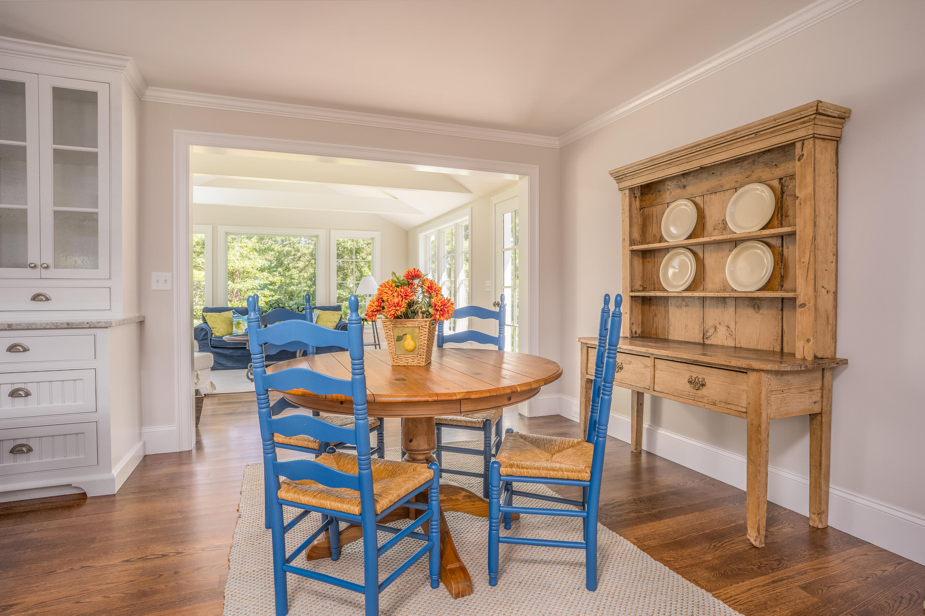 14 Crocker Rise Road Harwich, MA 02645 - Photo 8 of 38 a dining room with furniture and wooden floor