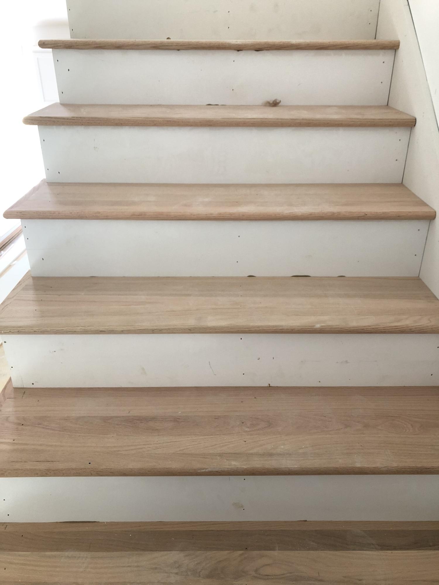 155 Hardee Branch Road West End, NC 27376 - Photo 9 of 25 charming wooden treads on the main stairs. Black metal spindles compliment and contrast for a great look