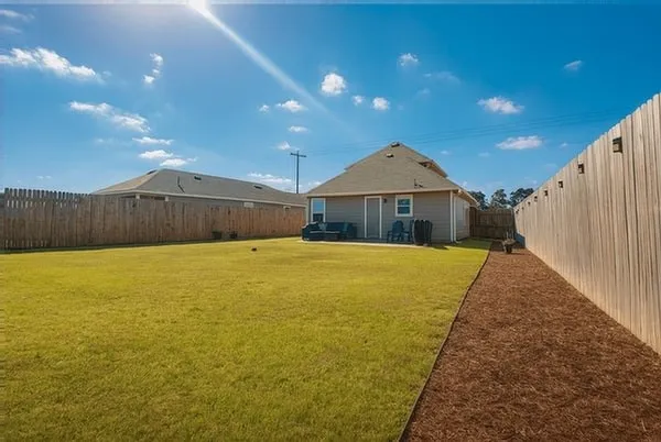 a front view of a house with swimming pool
