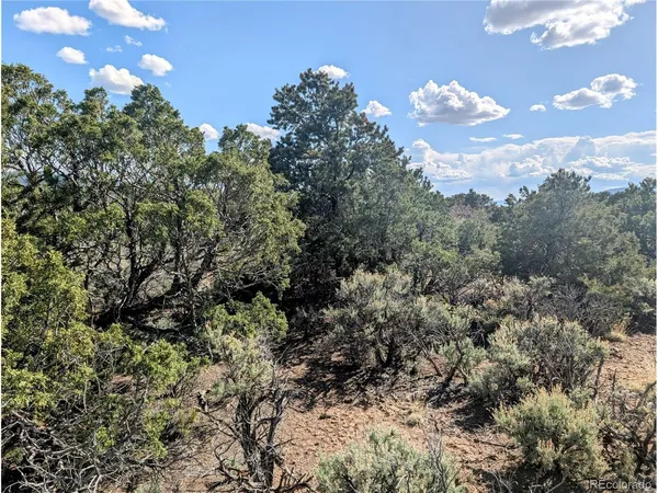 a view of a lake with mountains in the background