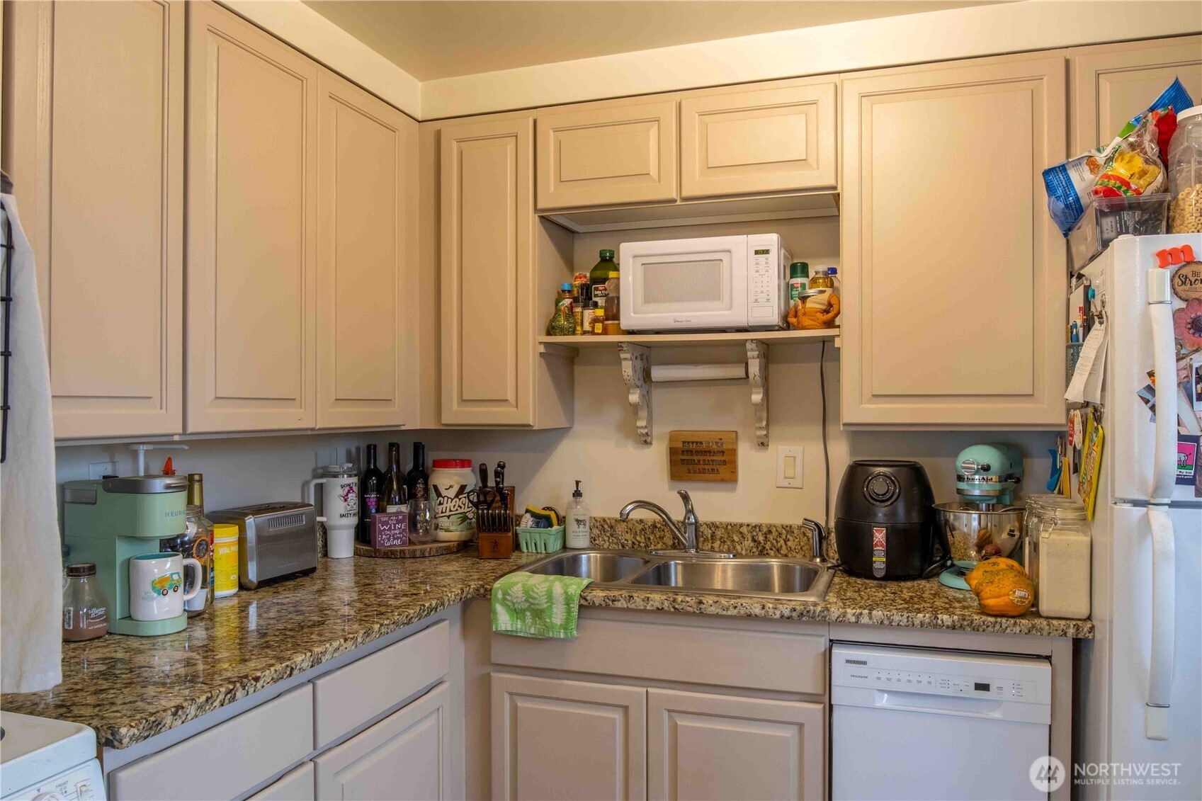 150 Lavender Court, Unit 43 Wenatchee, WA 98801 - Photo 14 of 17 a kitchen with stainless steel appliances granite countertop a sink a stove and cabinets