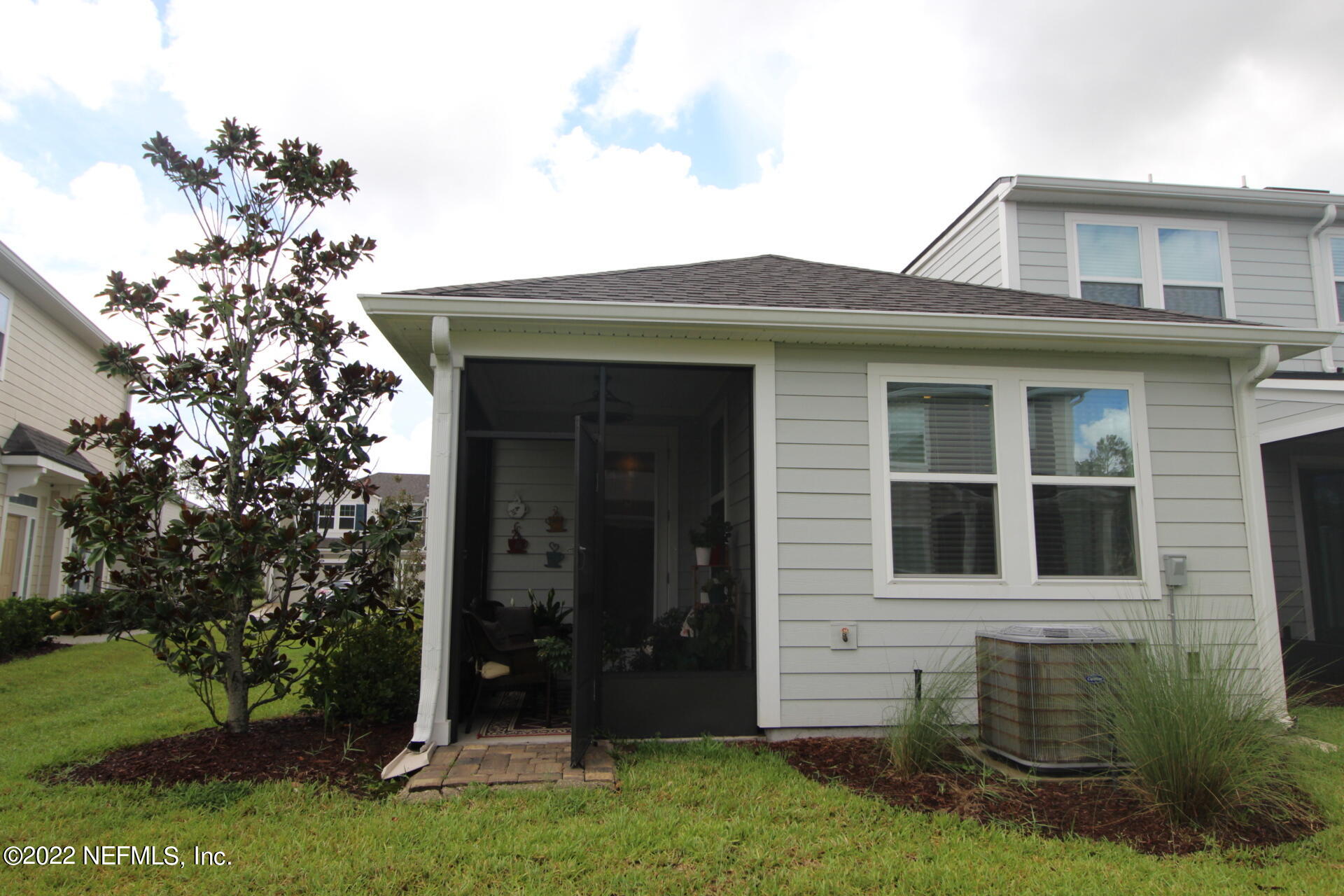 552 Richmond Drive St. Johns, FL 32259 - Photo 12 of 50 a view of a house with a yard