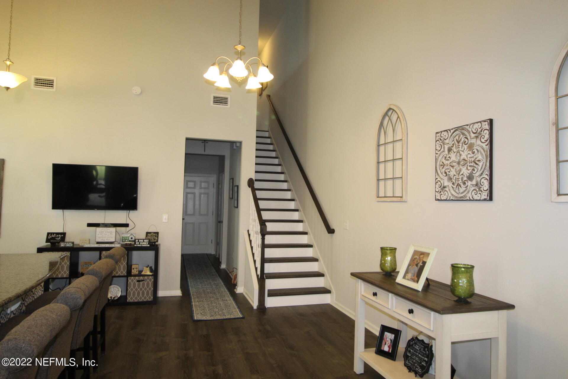 552 Richmond Drive St. Johns, FL 32259 - Photo 17 of 50 a view of a livingroom with furniture and a flat screen tv