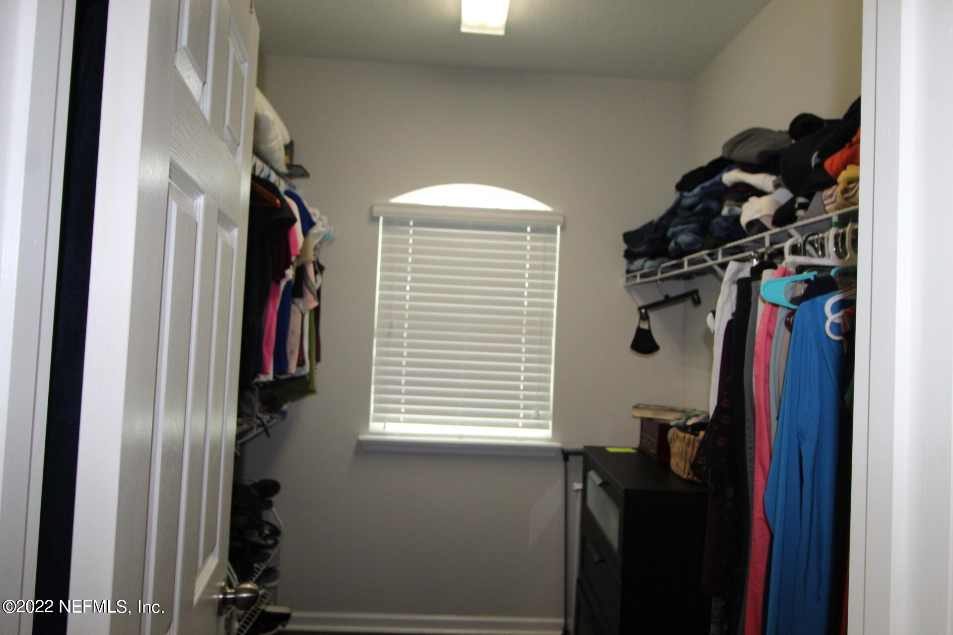 552 Richmond Drive St. Johns, FL 32259 - Photo 24 of 50 a view of walk in closet with clothes