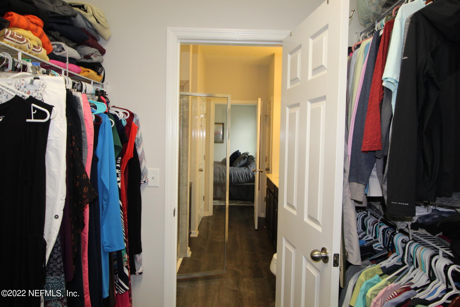 552 Richmond Drive St. Johns, FL 32259 - Photo 25 of 50 a view of walk in closet with clothes