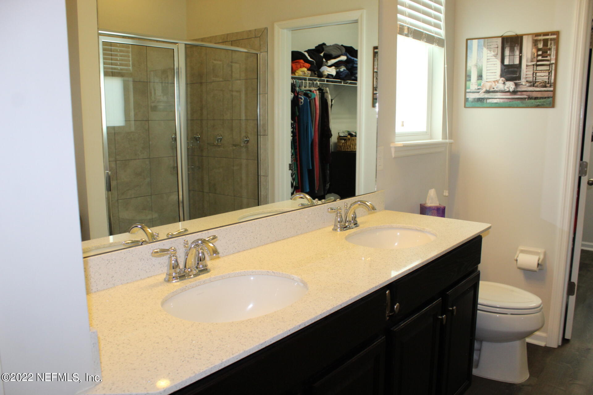 552 Richmond Drive St. Johns, FL 32259 - Photo 28 of 50 a bathroom with a sink and a mirror
