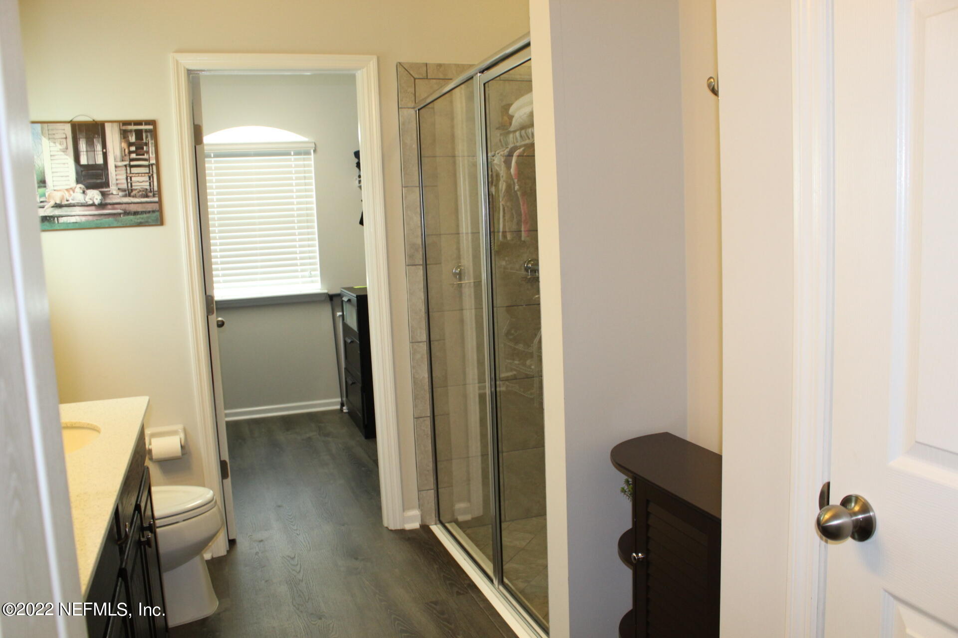 552 Richmond Drive St. Johns, FL 32259 - Photo 30 of 50 a view of a hallway with wooden floor and closet