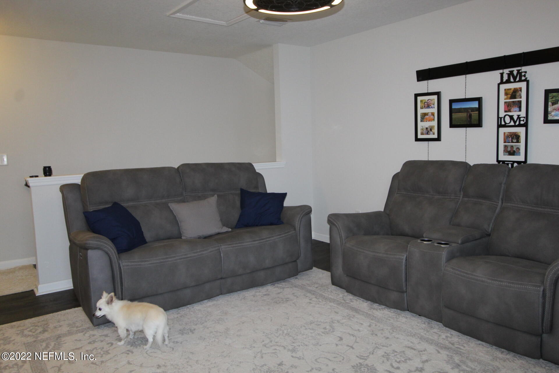 552 Richmond Drive St. Johns, FL 32259 - Photo 36 of 50 a living room with furniture and a window