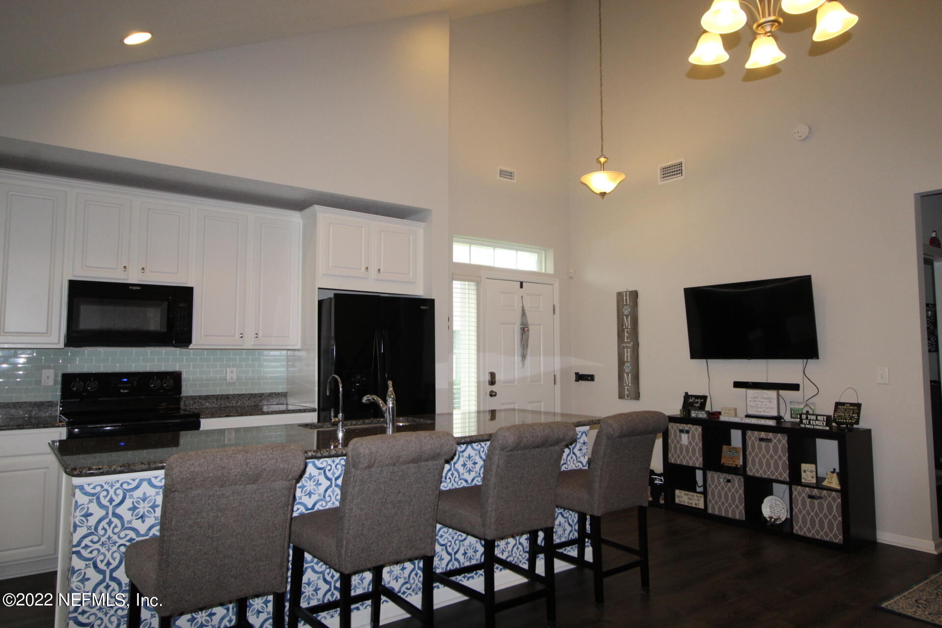 552 Richmond Drive St. Johns, FL 32259 - Photo 4 of 50 a view of a dining room with furniture