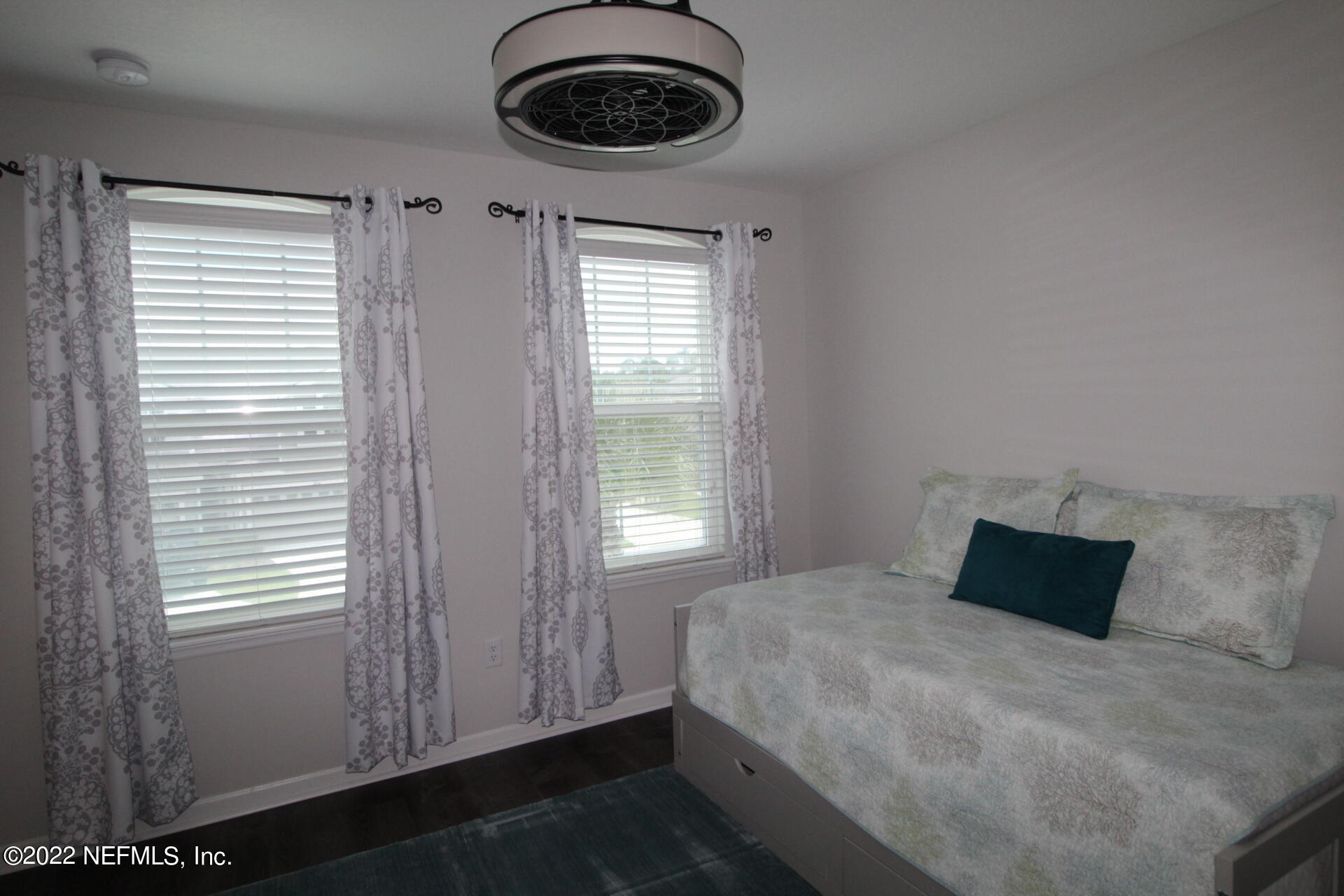 552 Richmond Drive St. Johns, FL 32259 - Photo 45 of 50 a bedroom with a bed and a window