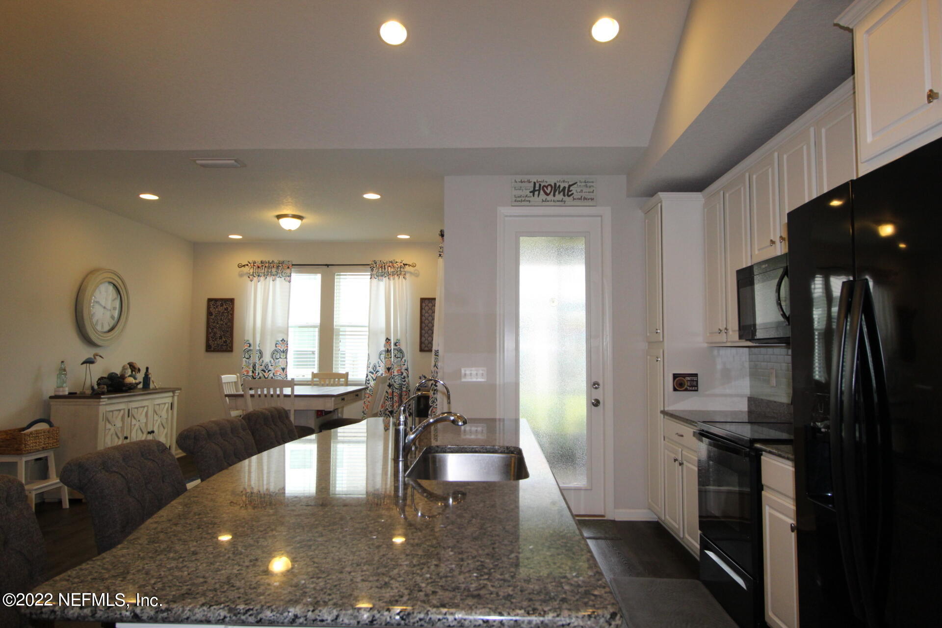 552 Richmond Drive St. Johns, FL 32259 - Photo 5 of 50 a large kitchen with stainless steel appliances