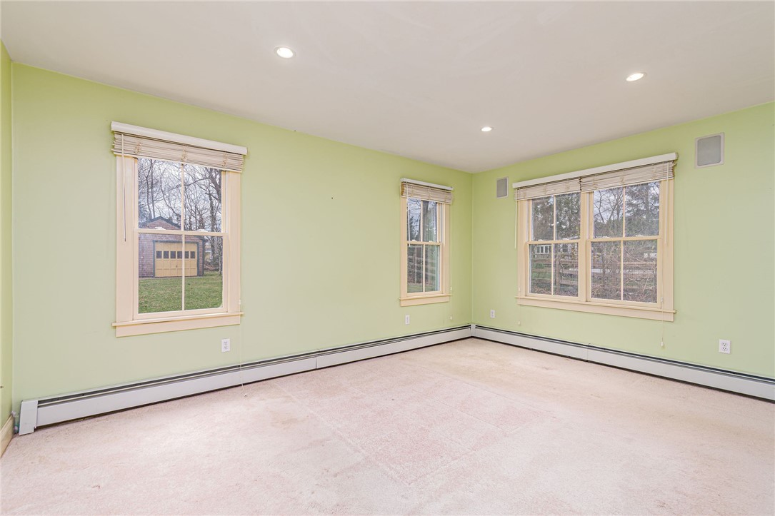 61 Howland Avenue Jamestown, RI 02835 - Photo 24 of 31 1st floor primary bedroom
