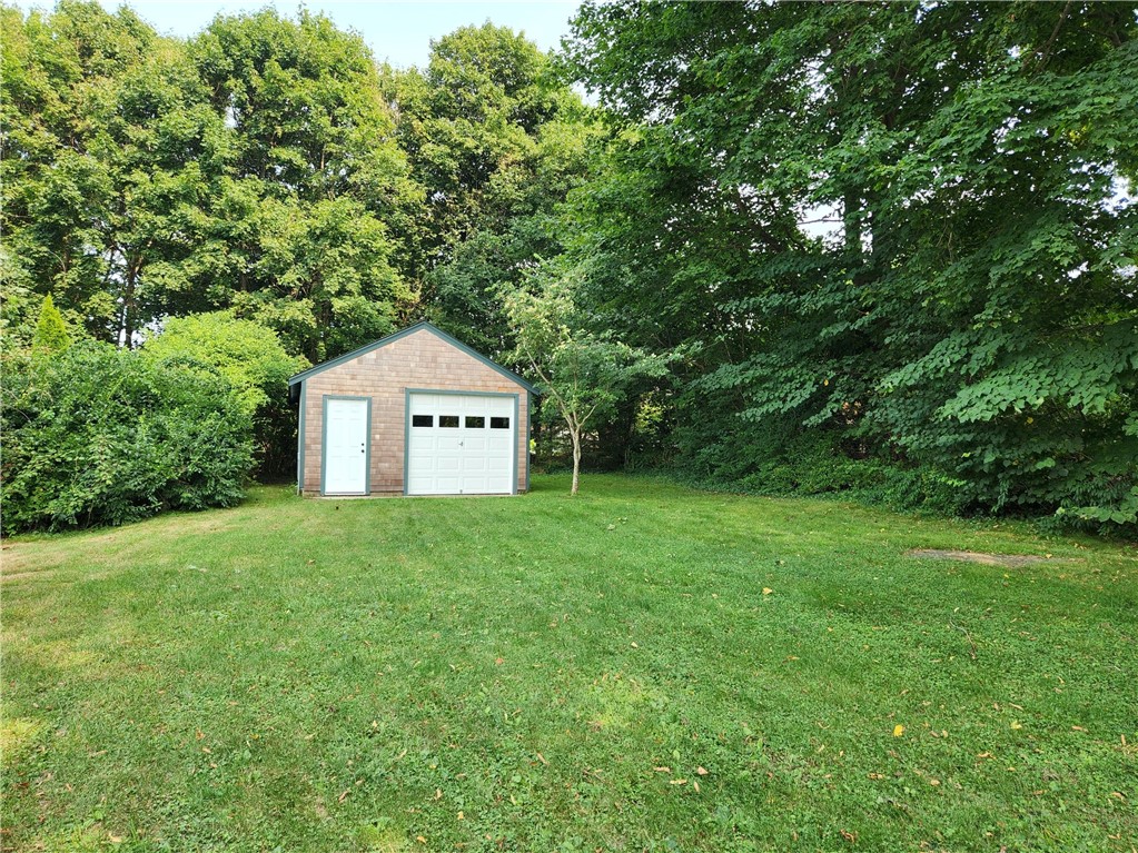 61 Howland Avenue Jamestown, RI 02835 - Photo 4 of 31 Detached garage, ideal for all your water toys, island car, or a future pool cabana