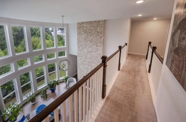 a view of staircase with large window