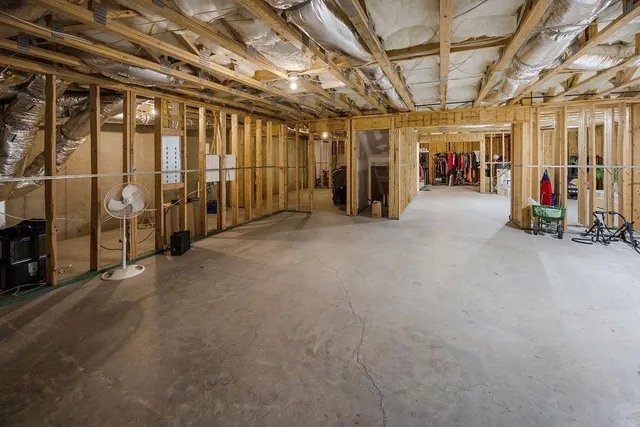 a view of a empty room with wooden walls