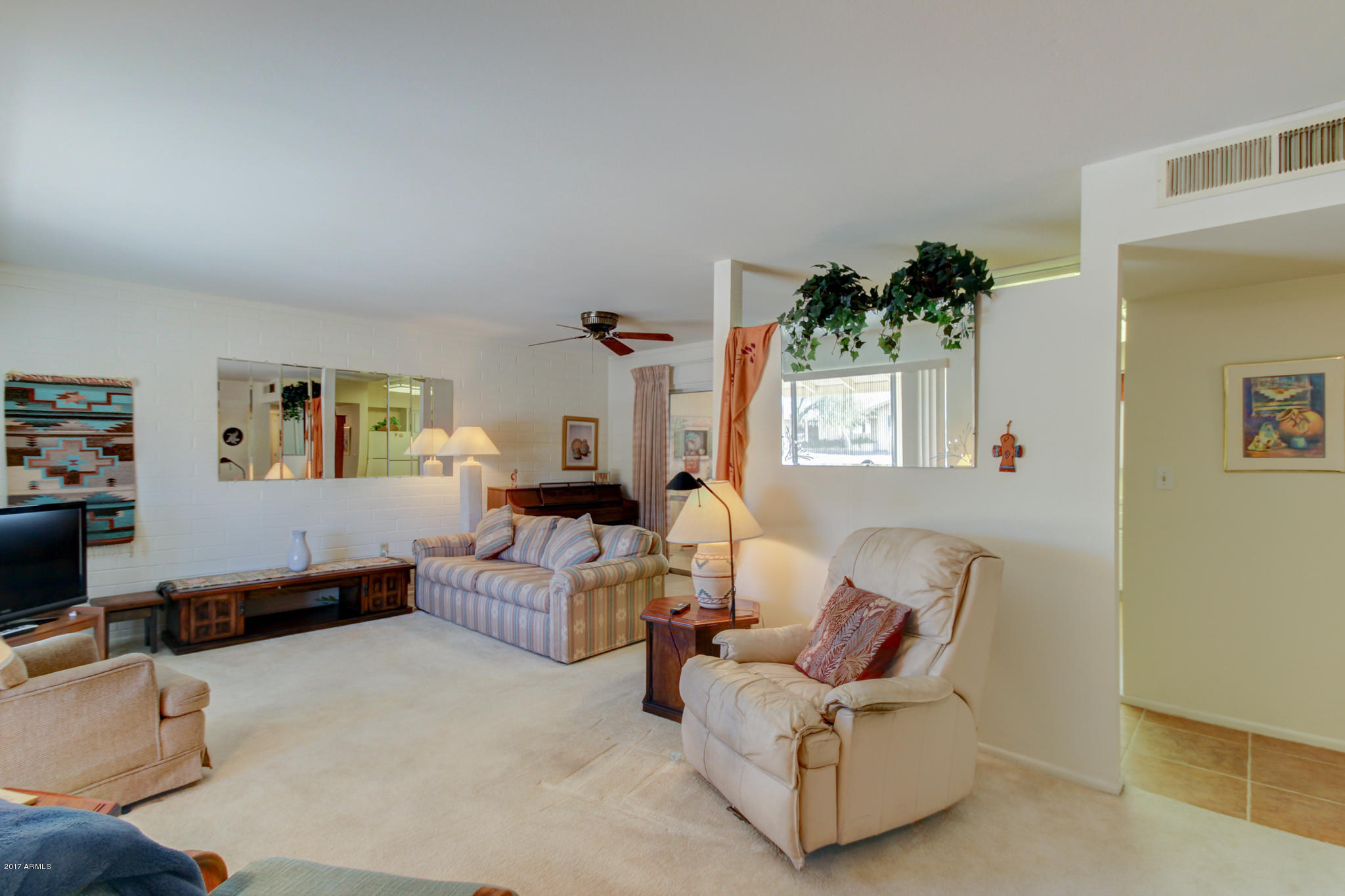 10008 West Riviera Drive Sun City, AZ 85351 - Photo 10 of 26 a living room with furniture