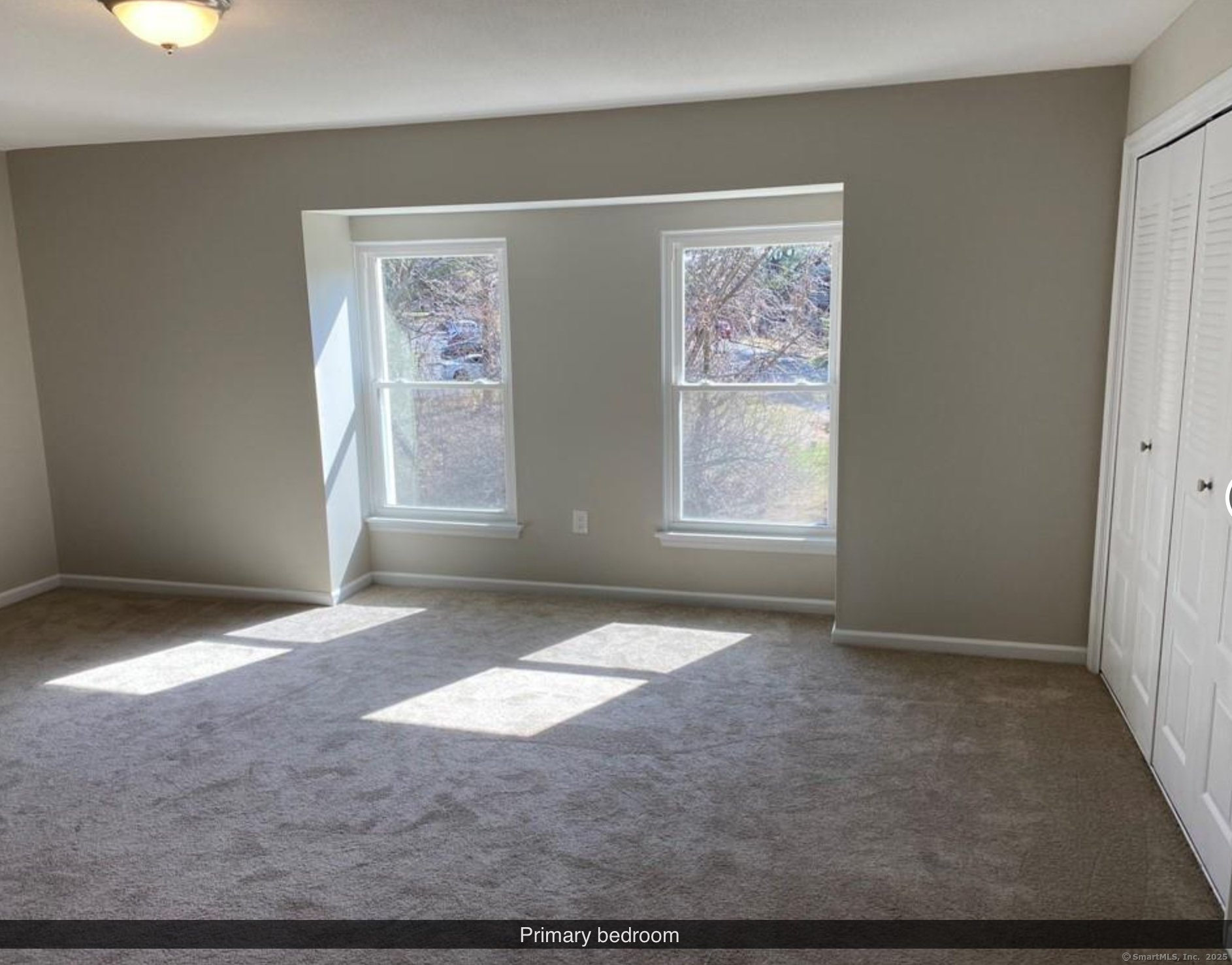 99 Brittany Farms Road, Unit F New Britain, CT 06053 - Photo 13 of 31 a view of livingroom with window