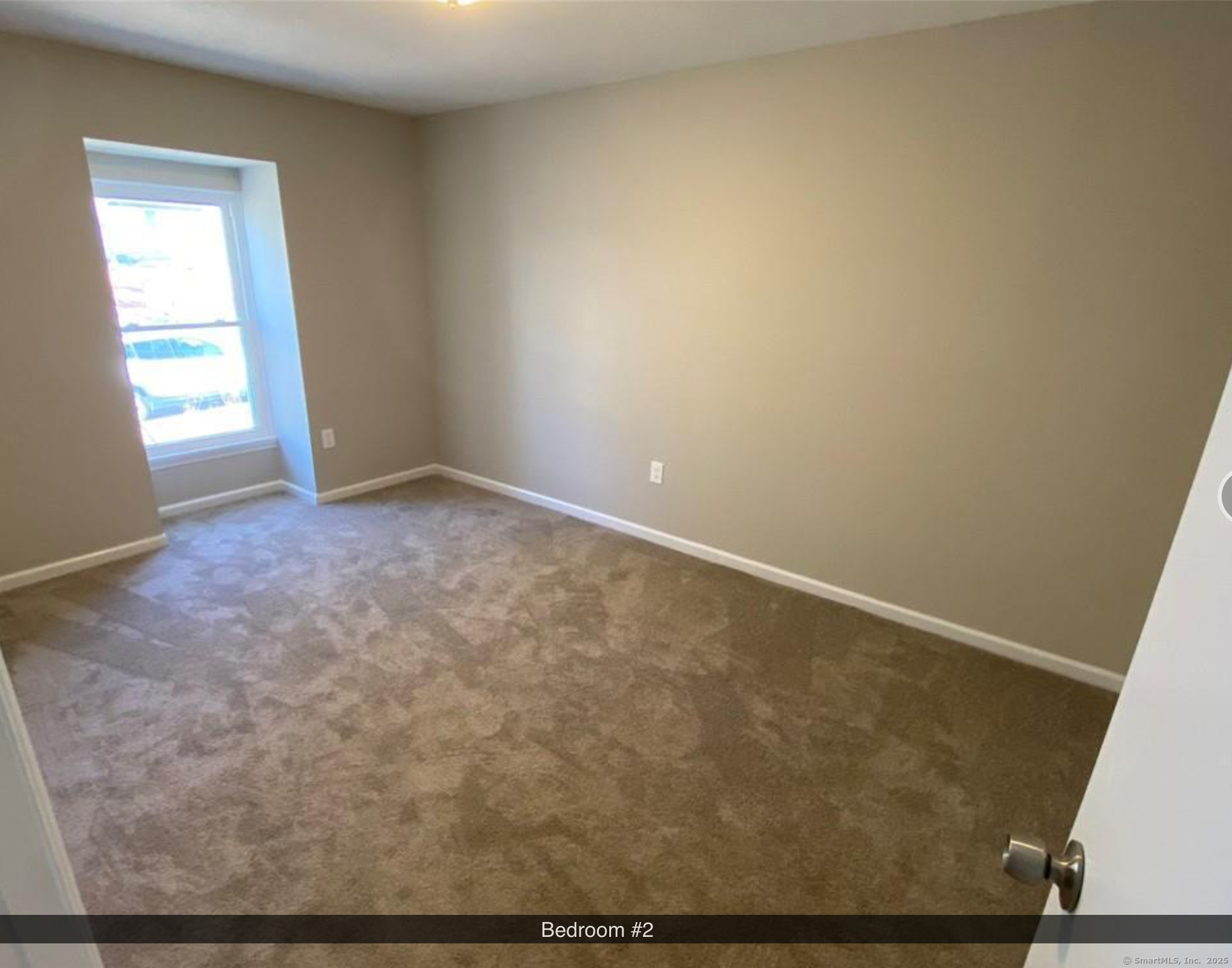 99 Brittany Farms Road, Unit F New Britain, CT 06053 - Photo 16 of 31 an empty room with windows