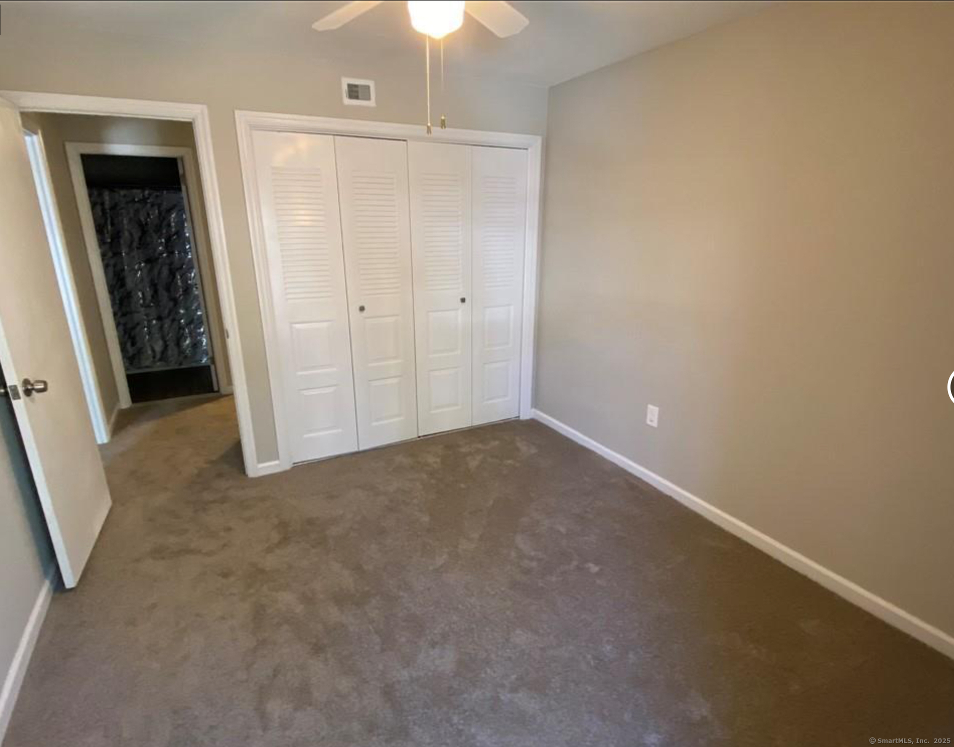 99 Brittany Farms Road, Unit F New Britain, CT 06053 - Photo 19 of 31 an empty room with an entryway