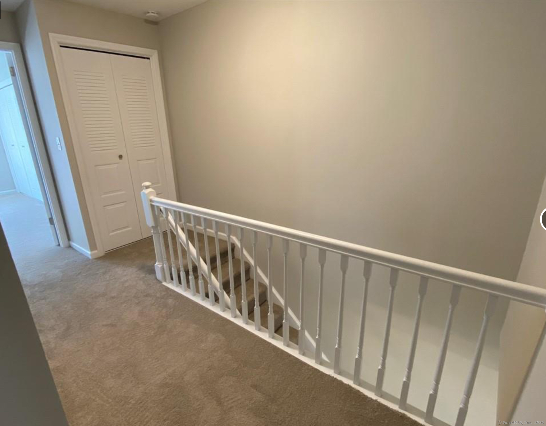 99 Brittany Farms Road, Unit F New Britain, CT 06053 - Photo 20 of 31 a view of a hallway