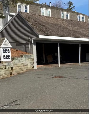 a front view of a house with a garage