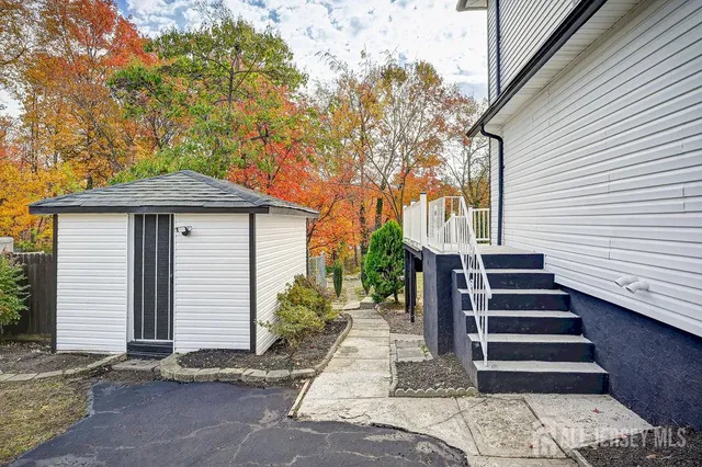 a view of backyard with green space