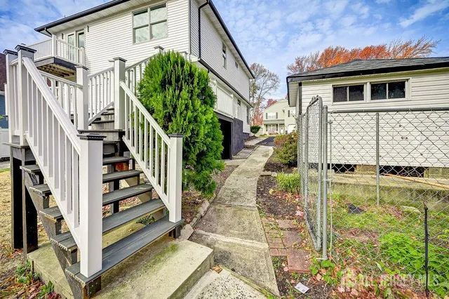 a view of a house with a large window