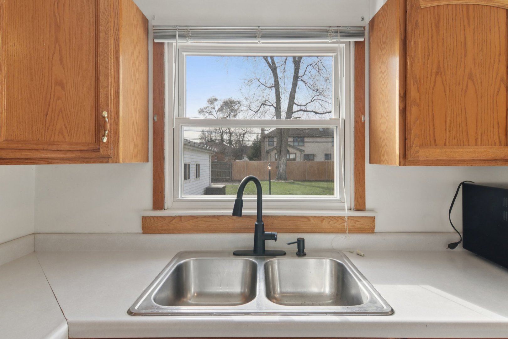 7416 Thomas Avenue Bridgeview, IL 60455 - Photo 14 of 32 a close view of sink and tap
