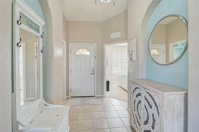 a kitchen with a stove and a window