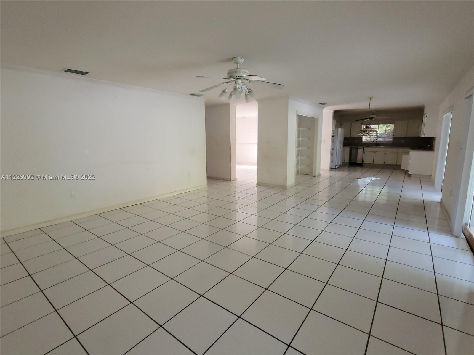 14830 Southwest 149th Street Miami, FL 33196 - Photo 17 of 25 a view of a livingroom with furniture