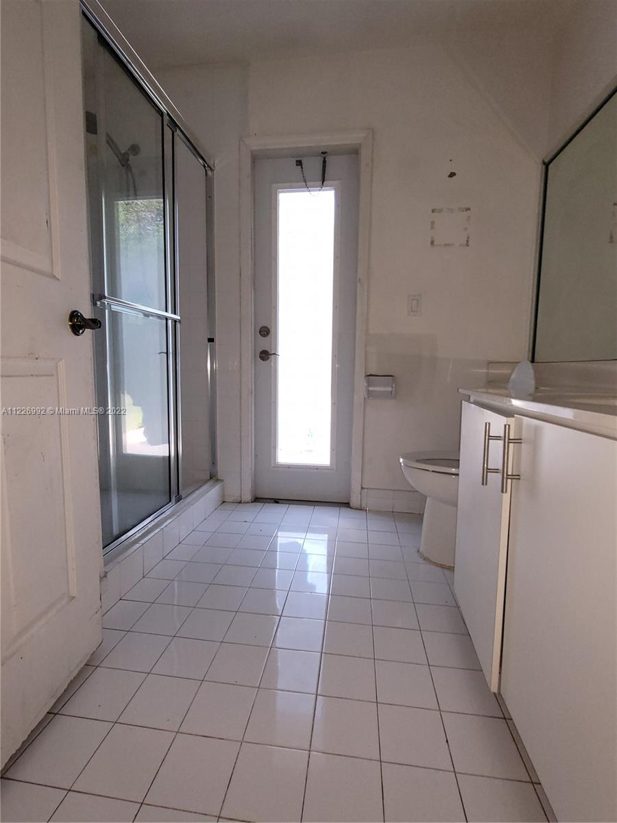 14830 Southwest 149th Street Miami, FL 33196 - Photo 18 of 25 a view of a storage & utility room with a sink