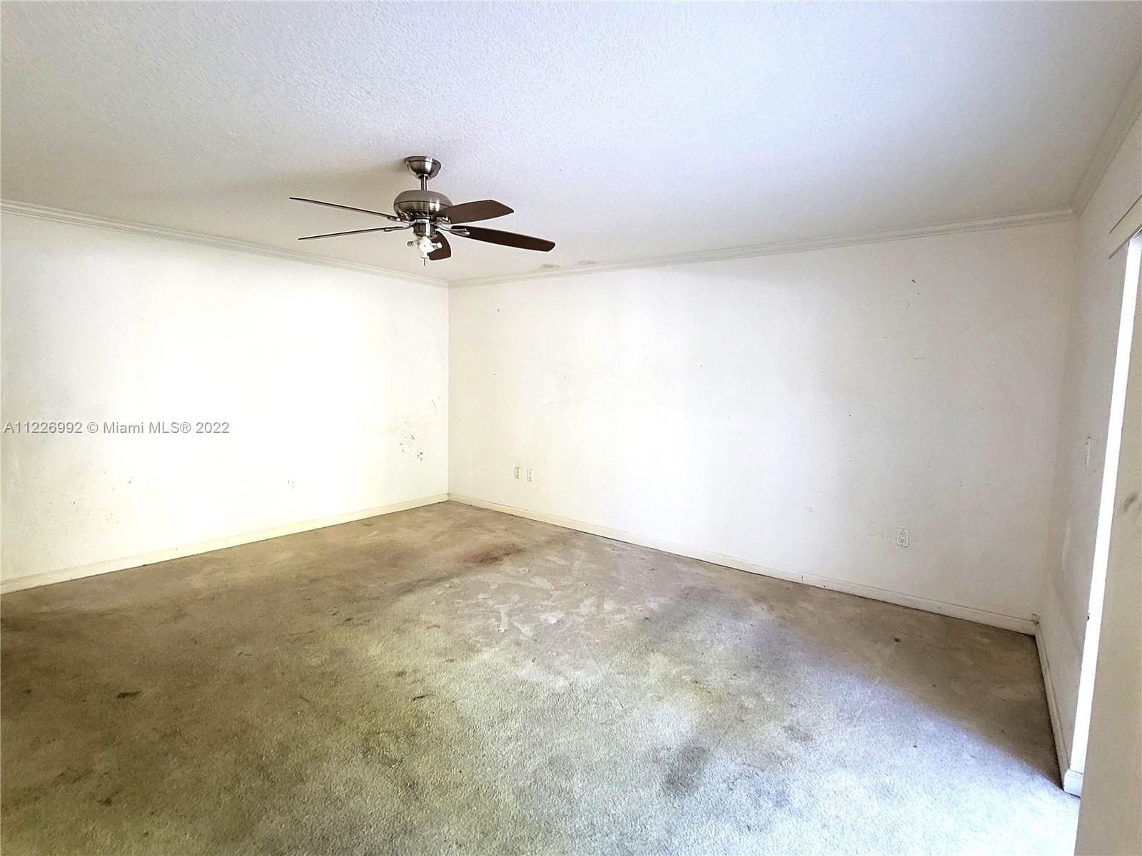 14830 Southwest 149th Street Miami, FL 33196 - Photo 6 of 25 a view of a big room with carpet