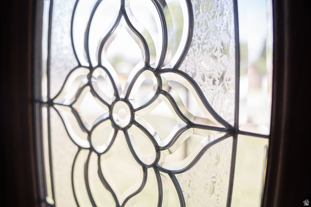 634 South 2100th Street West Vernal, UT 84078 - Photo 4 of 71 Leaded glass entry detail featuring clear beveled glass and textured glass panels