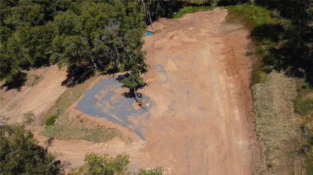 a view of a backyard of a house