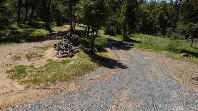 a view of a road with a trees