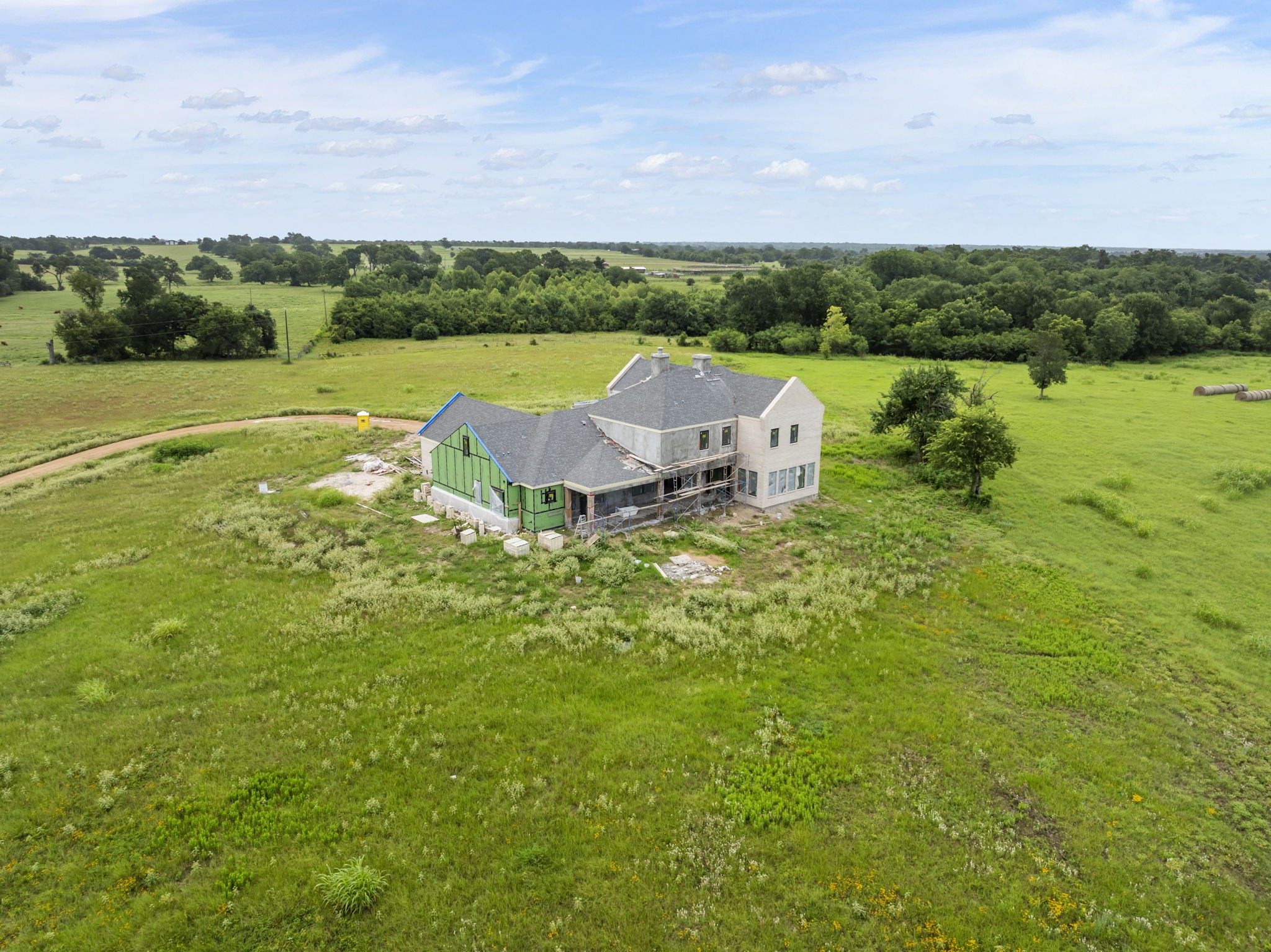 a view of a lake with houses in the background