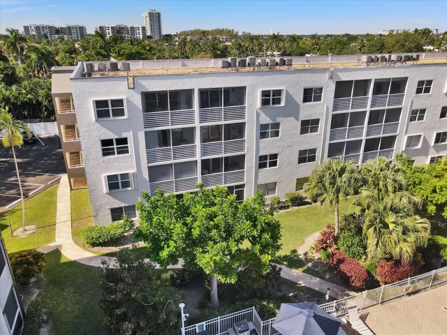 a view of a building with a garden