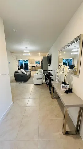 a living room with furniture and a couch