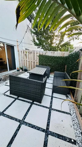 a view of balcony with wooden floor