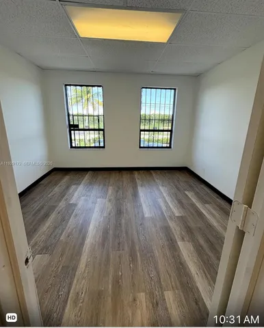 a car parked in front of a building