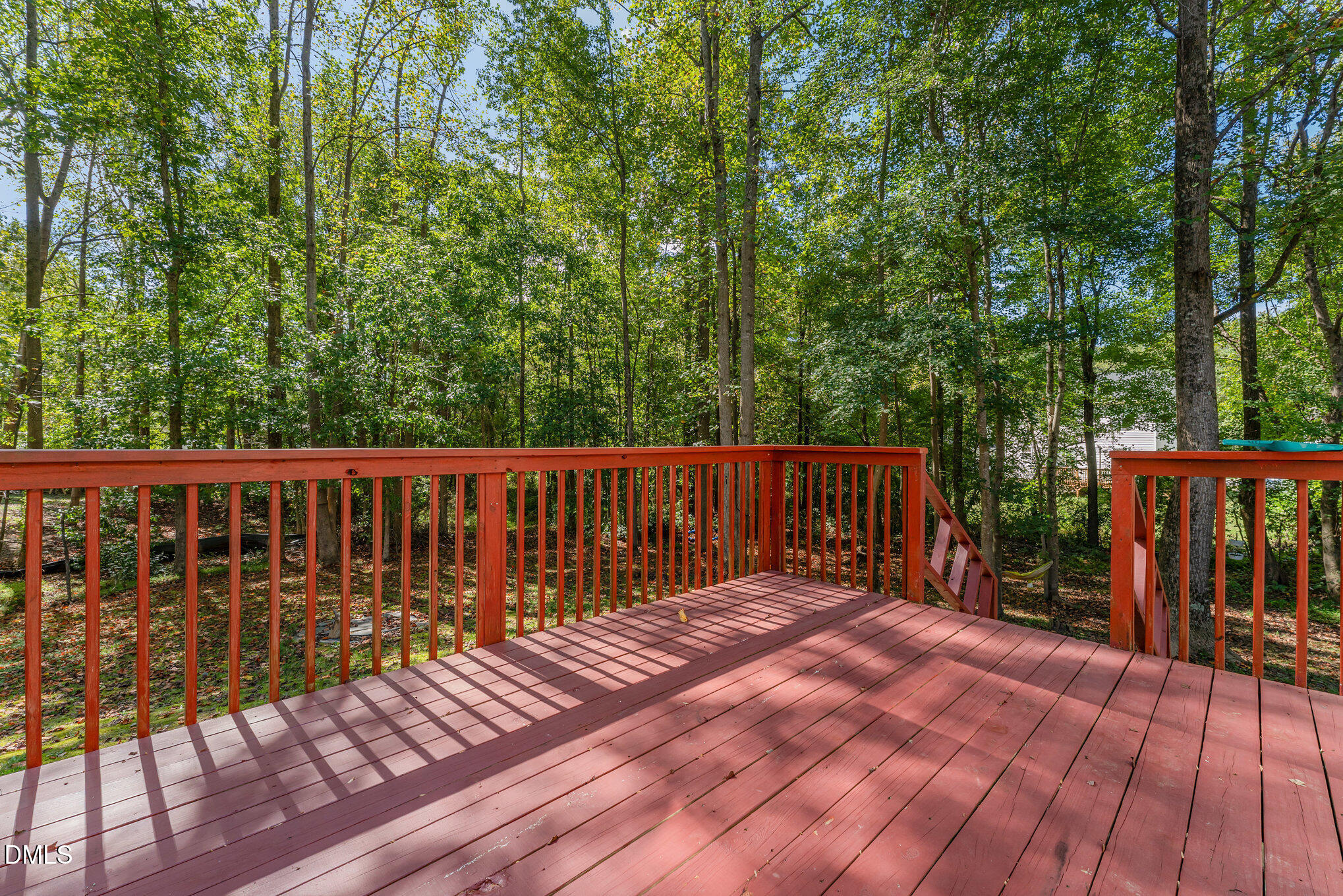 687 West Watson Road Benson, NC 27504 - Photo 16 of 25 a view of balcony with wooden floor