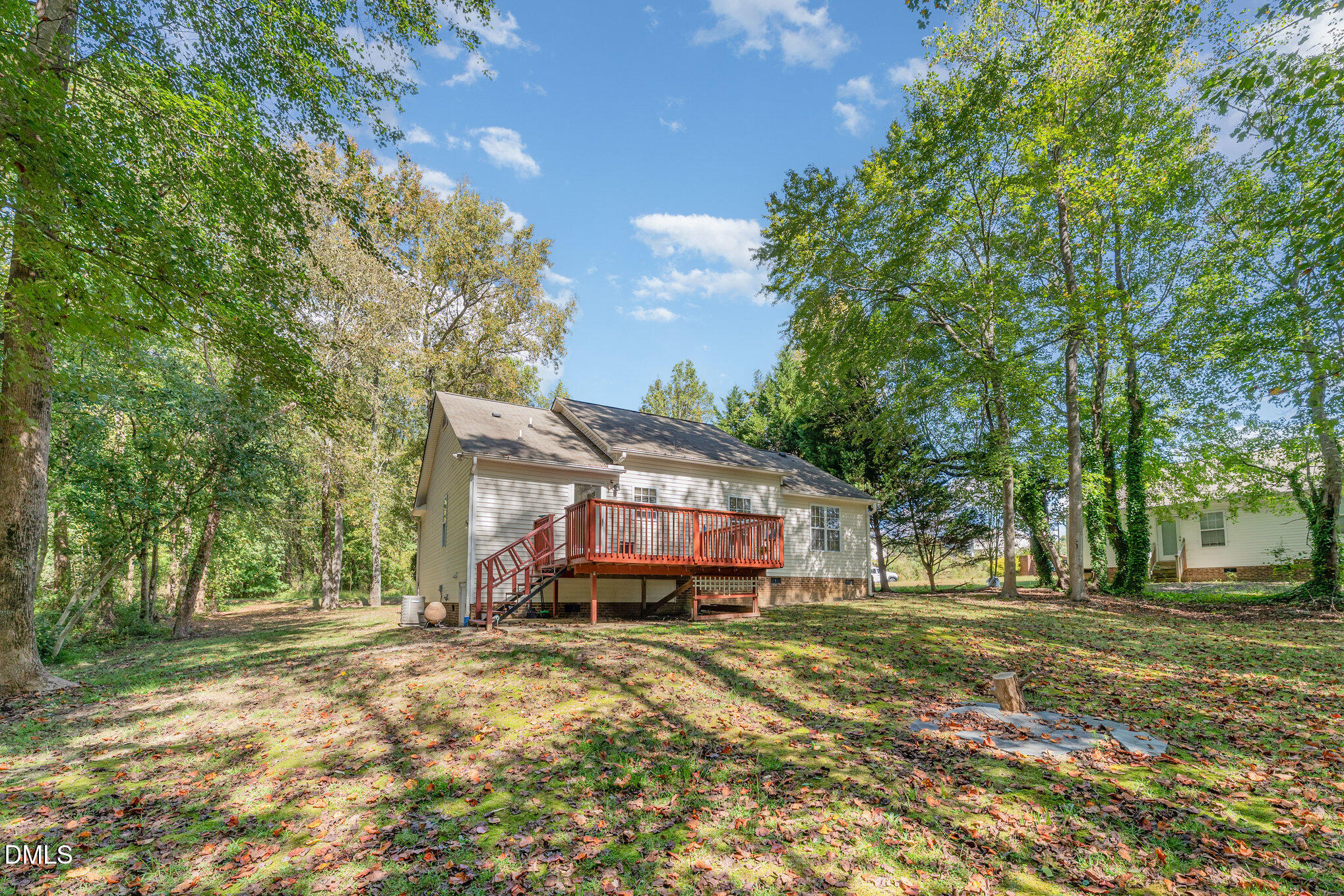 687 West Watson Road Benson, NC 27504 - Photo 19 of 25 a front view of a house with a yard