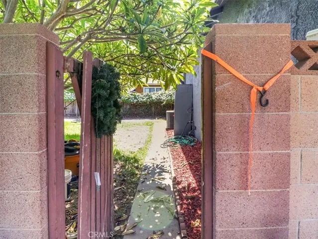 a backyard of a house with seating space