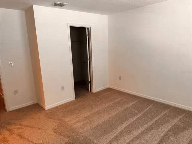 an empty room with closet