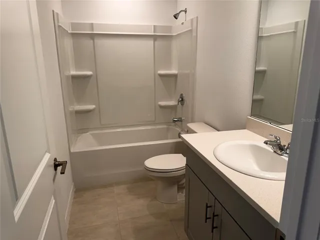 a view of a room with a window