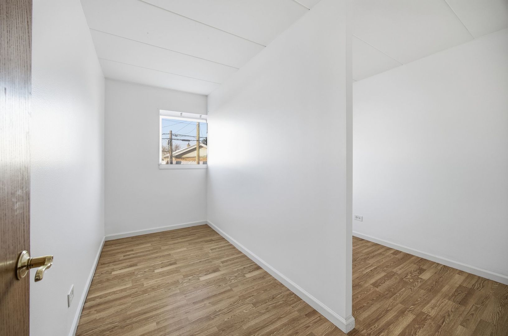 4618 River Road, Unit 1D Schiller Park, IL 60176 - Photo 11 of 12 a view of empty room with wooden floor